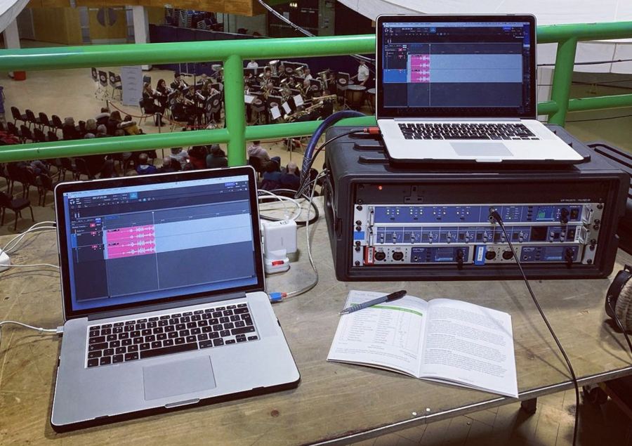 Multitrack recording rig above a brass band